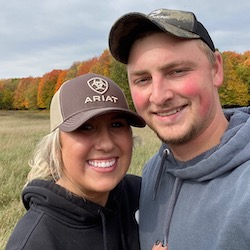 Maddie and Trent in the woods.